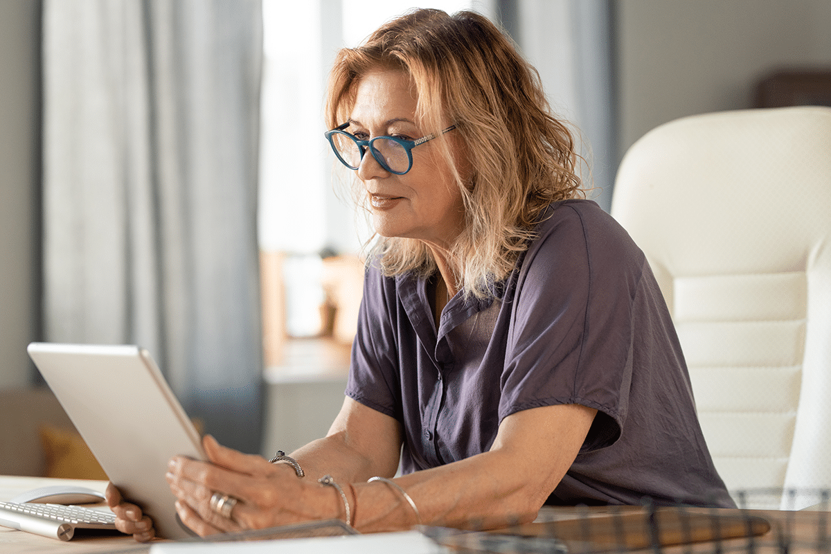 woman reading tablet