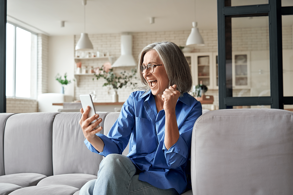 Excited woman winning schedule award