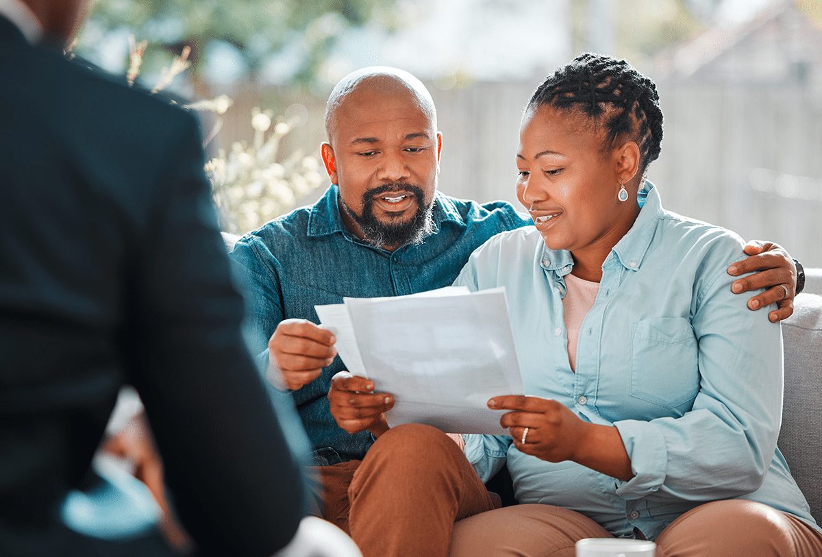 couple reading about the OPM retirement backlog rising