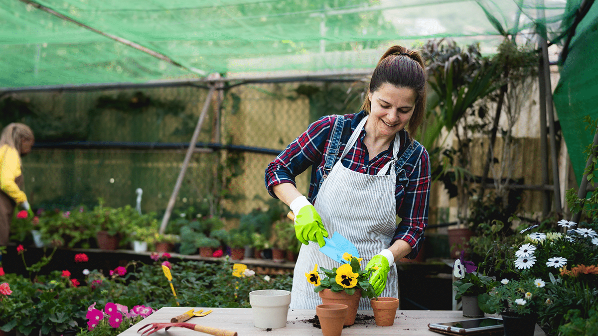 woman working after federal disability retirement gardening