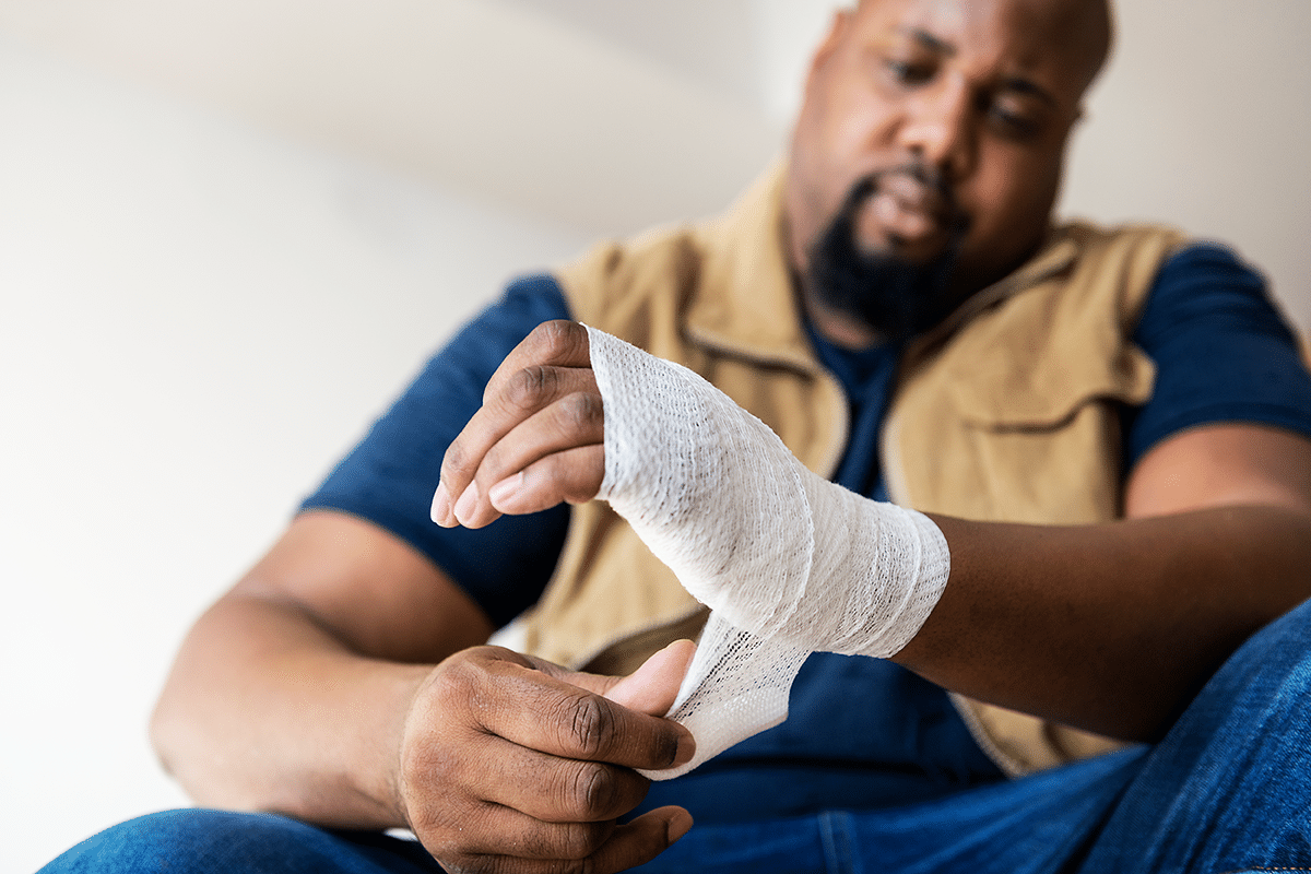 man wrapping injured wrist wondering what qualifies as a disability for Federal Disability Retirement